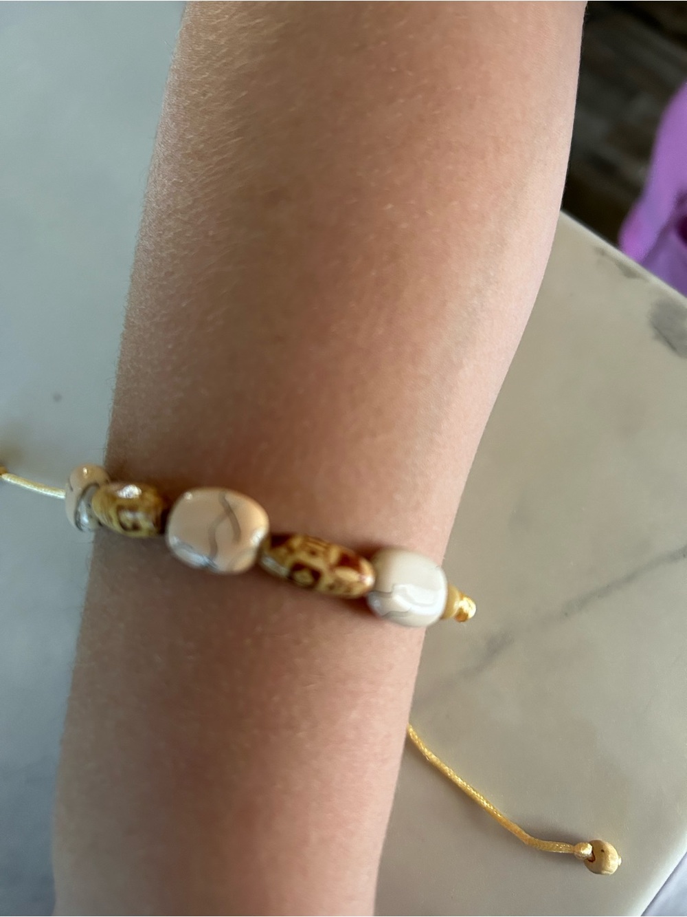 Adjustable White and Gold Bead Bracelet